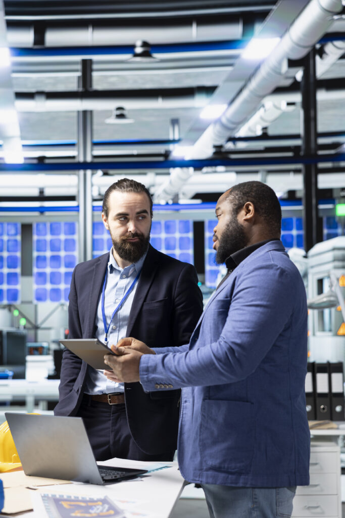 Team group of industry experts and engineers analyzing solar panel systems